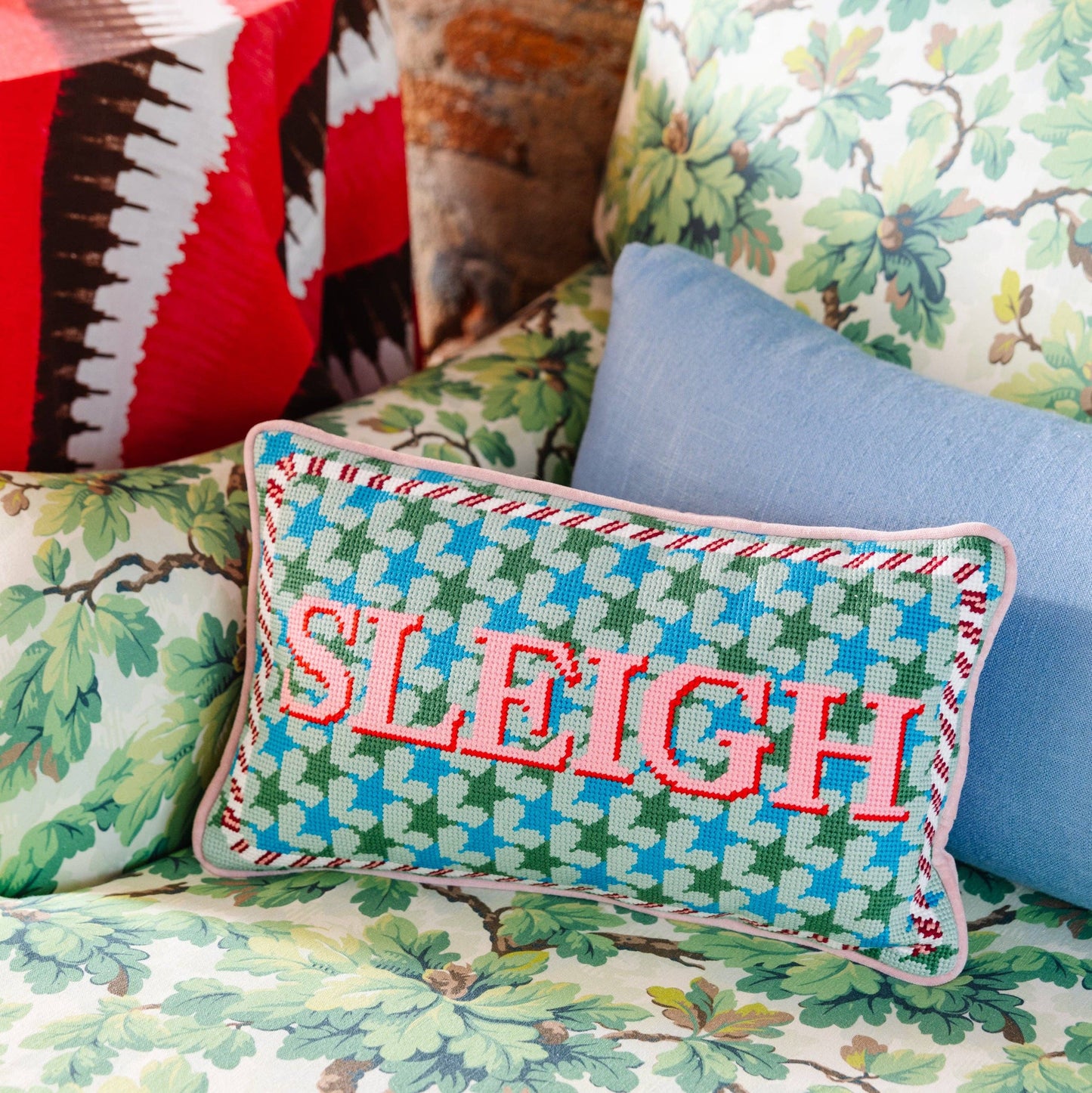 sleigh needlepoint pillow